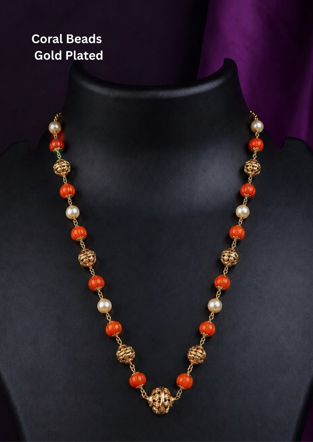 A coral bead and gold-plated beaded necklace Traditional coral gold plated necklace featuring coral stones, pearl stins and gold stones and intricate handcrafted detailing for an elegant festive appearances featuring intricate antique detailing with pearl Perfect for weddings, festivals and ethnic celebrations.