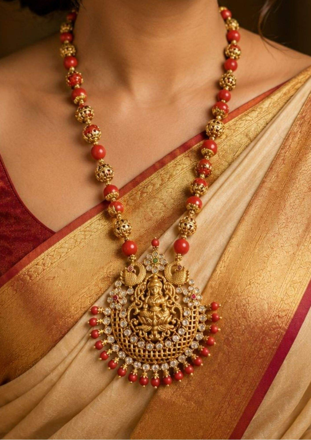 traditional women wore laxmi devi beads coral necklace with peacock design and with shine and good looking and used for  functional , festivals and gifting and wore by south Indian women's 