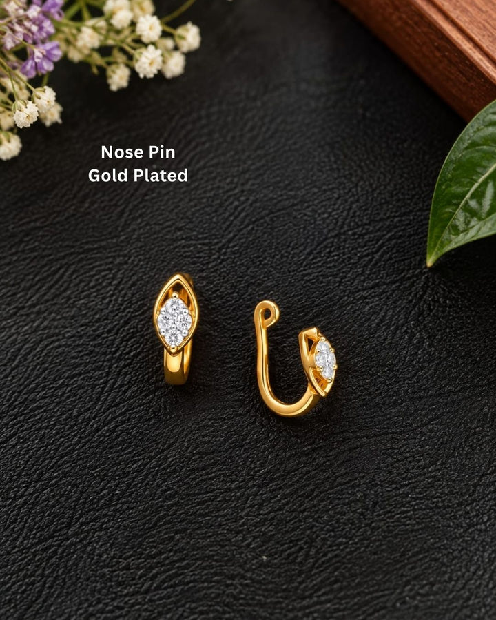 Minimal gold plated leaf design nose pin with sparkling white stones, perfect for everyday and festive wear.