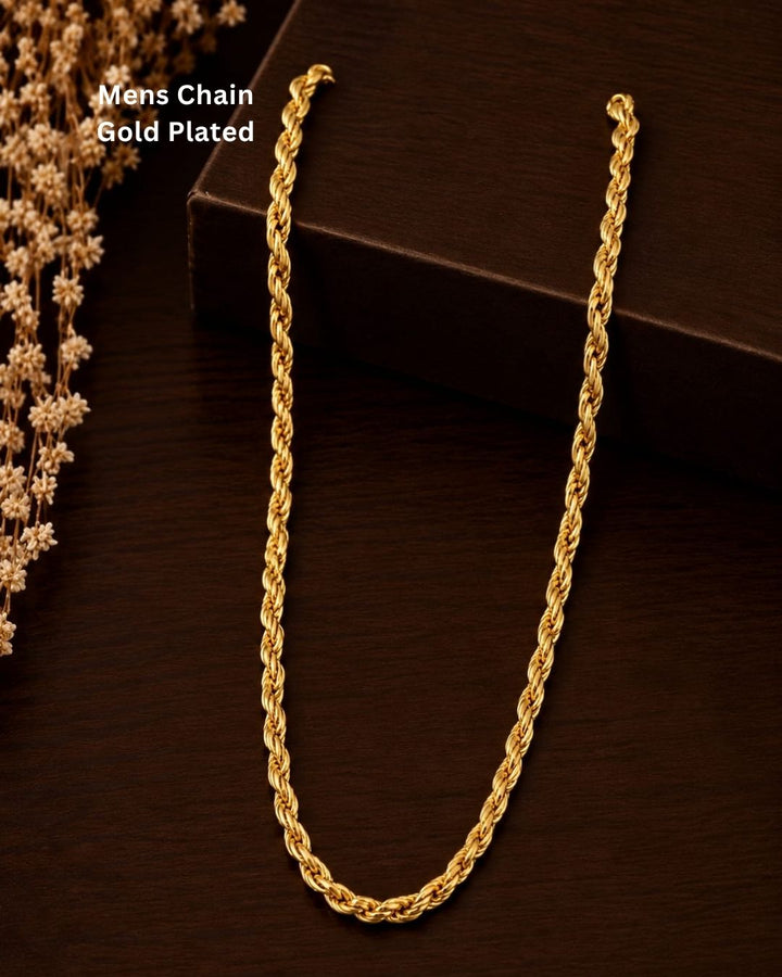 Gold plated men’s chain displayed in hand, highlighting its twisted links and shiny finish.