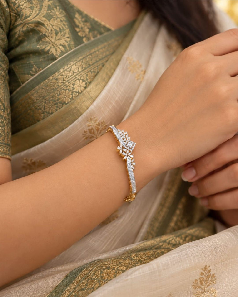 Gold plated openable bracelet featuring a dual-tone gold and silver finish with sparkling white CZ stones and intricate floral embellishments.