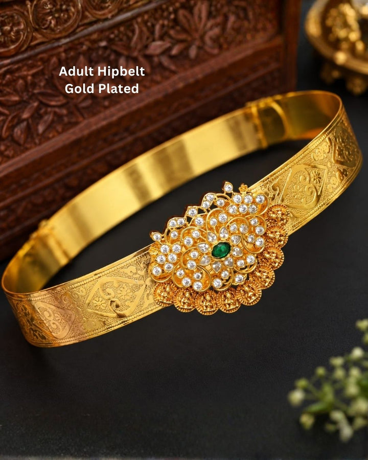 Elegant gold plated vaddanam with a floral crystal centerpiece and intricate detailing for festive and traditional wear.