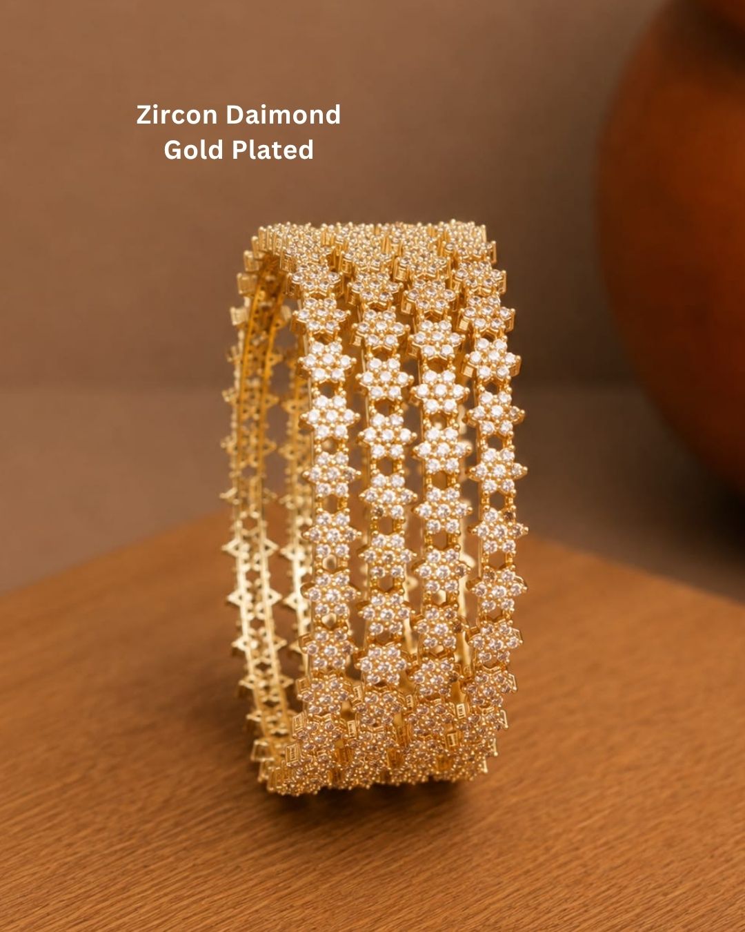 Beautiful gold plated zircon diamond bangle set with intricate floral stonework, perfect for weddings, festive occasions, traditional wear, and gifting.