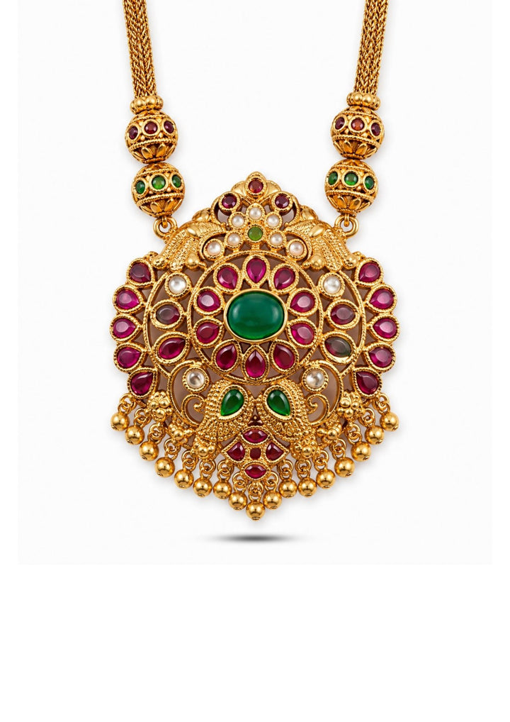 Gold necklace with red and green gemstones on a white background and pendent shown very clearly and in detailed way shown in picture it will sweat proof and water proof can used for festivals, bridals, and weeding's  