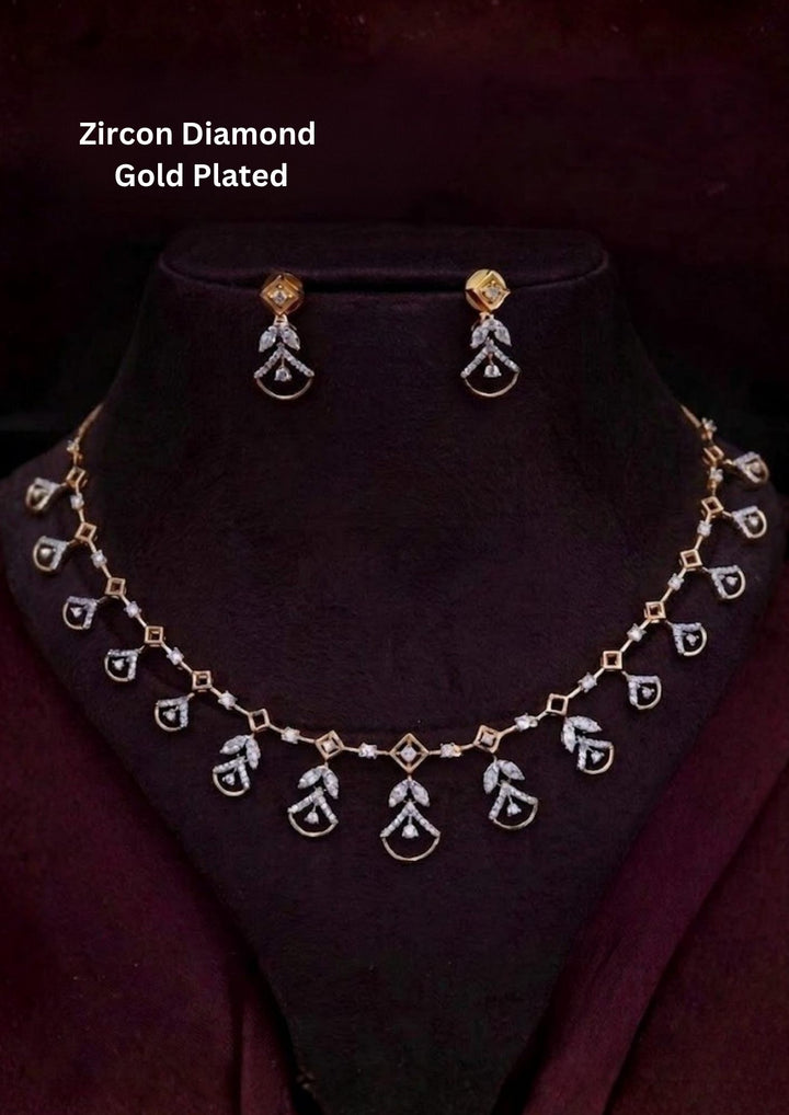 Zircon diamond Floral design gold plated necklace set with flower-shaped zircon diamond pattern, matching floral earrings, and elegant stone arrangement finished with shiny gold plating. The necklace set comes with lightweight, sweat proof quality, anti-fade colour, skin-friendly finish, smooth fitting, and is suitable for functions, festivals, weddings, parties, and traditional jewelry wear and for gifting