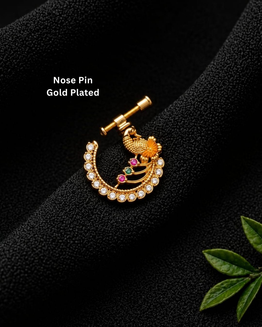 Traditional gold plated peacock-inspired nose pin with white CZ stones and pink and green accents, featuring a screw-back design.
