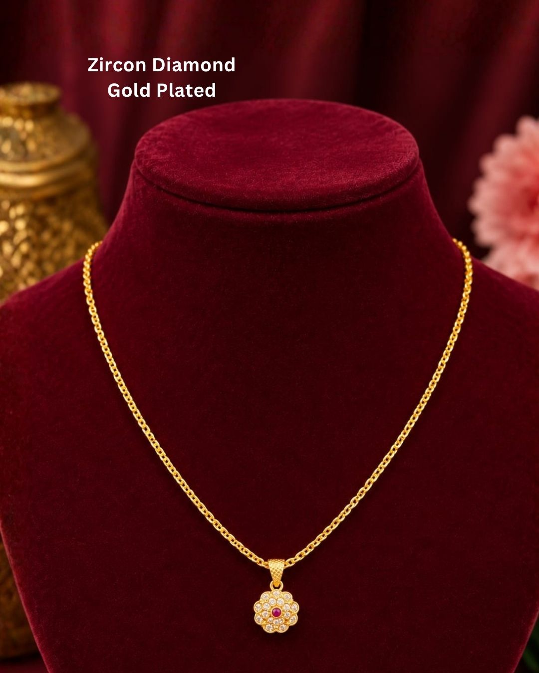 Beautiful gold plated necklace featuring a delicate chain and floral-inspired pendant adorned with sparkling stones and a pink center stone. Perfect for traditional wear, festive occasions, weddings, daily wear, and gifting.