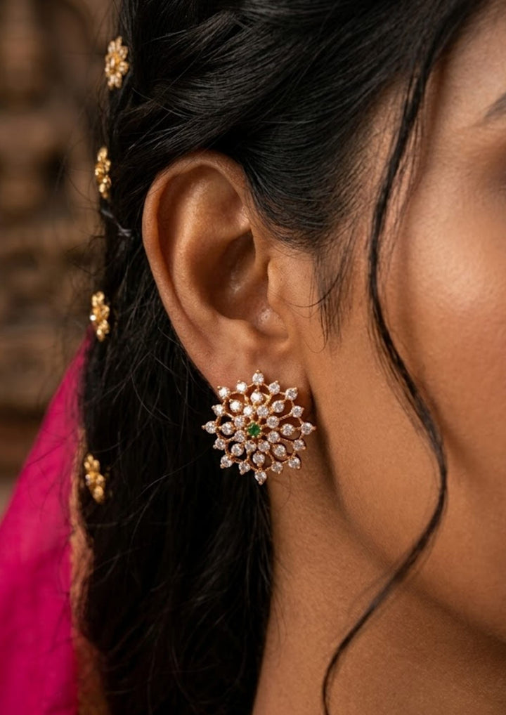 South Indian women wearing Gold Plated Ziricon Diamond Studs 18K gold plated with a traditional and designed with kempu stone and white pearls in round shape with three rows. Perfect for festivals, temple visits, weddings, and functions. The earrings are lightweight, comfortable, skin-safe, and give a rich bridal-style appearance.