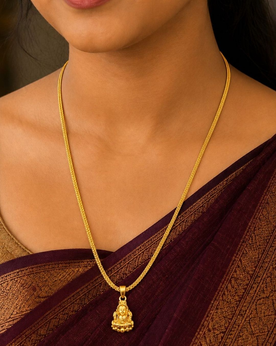 South Indian women Beautiful gold plated necklace featuring a delicate textured chain and a traditional Lakshmi goddess pendant with intricate detailing. Perfect for traditional wear, festive occasions, weddings, daily wear, and gifting.