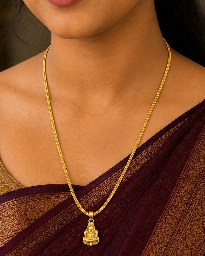 South Indian women Beautiful gold plated necklace featuring a delicate textured chain and a traditional Lakshmi goddess pendant with intricate detailing. Perfect for traditional wear, festive occasions, weddings, daily wear, and gifting.