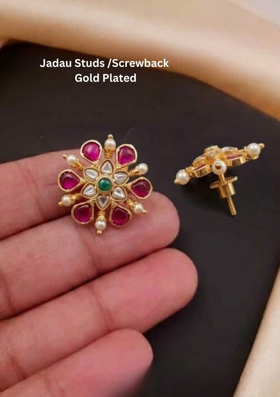Gold-plated Jadau kundan studs with screw back come with pink gemstone and looks very elegant and  comes with much detailed look and can use for daily ware, functional ware, festive ware nad perfect for giffting 