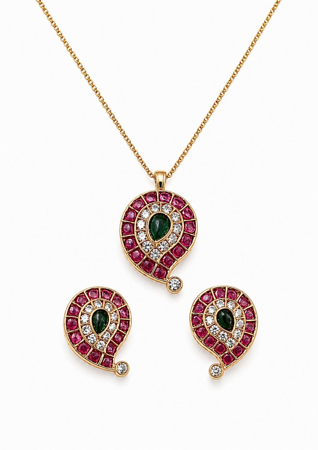 18k Jadau Kundan Gold Plated mango pendant set with matching earrings designed in mango shape pattern with pink ruby stones, and emerald green stone in center with sparkling white zircon stones. This lightweight jewelry set comes with sweat proof quality, anti-fade colour, skin-friendly finish, smooth fitting, and is suitable for weddings, festivals, dailywear