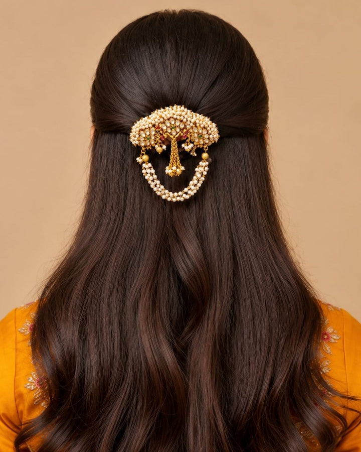 Traditional Indian hair ornament with pearl beadwork, kundan accents, and gold-tone hanging details for festive and bridal hairstyles.