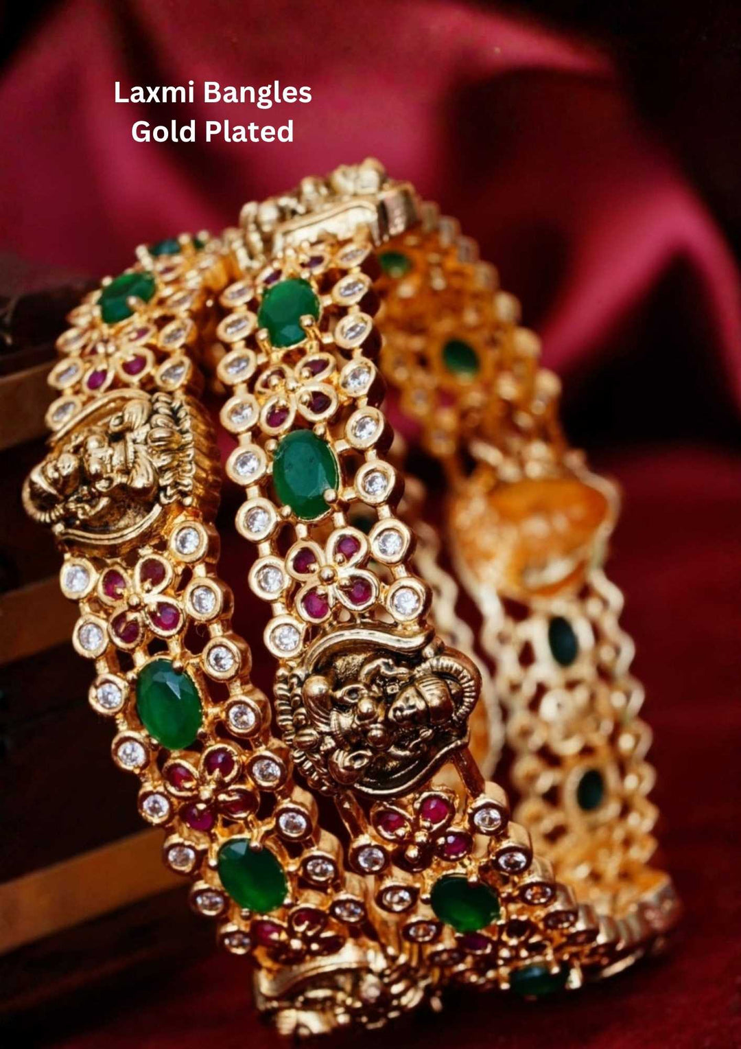 gold plated laxmi devi bangles with emerald classic look bangles and can use for functional ware, festive ware