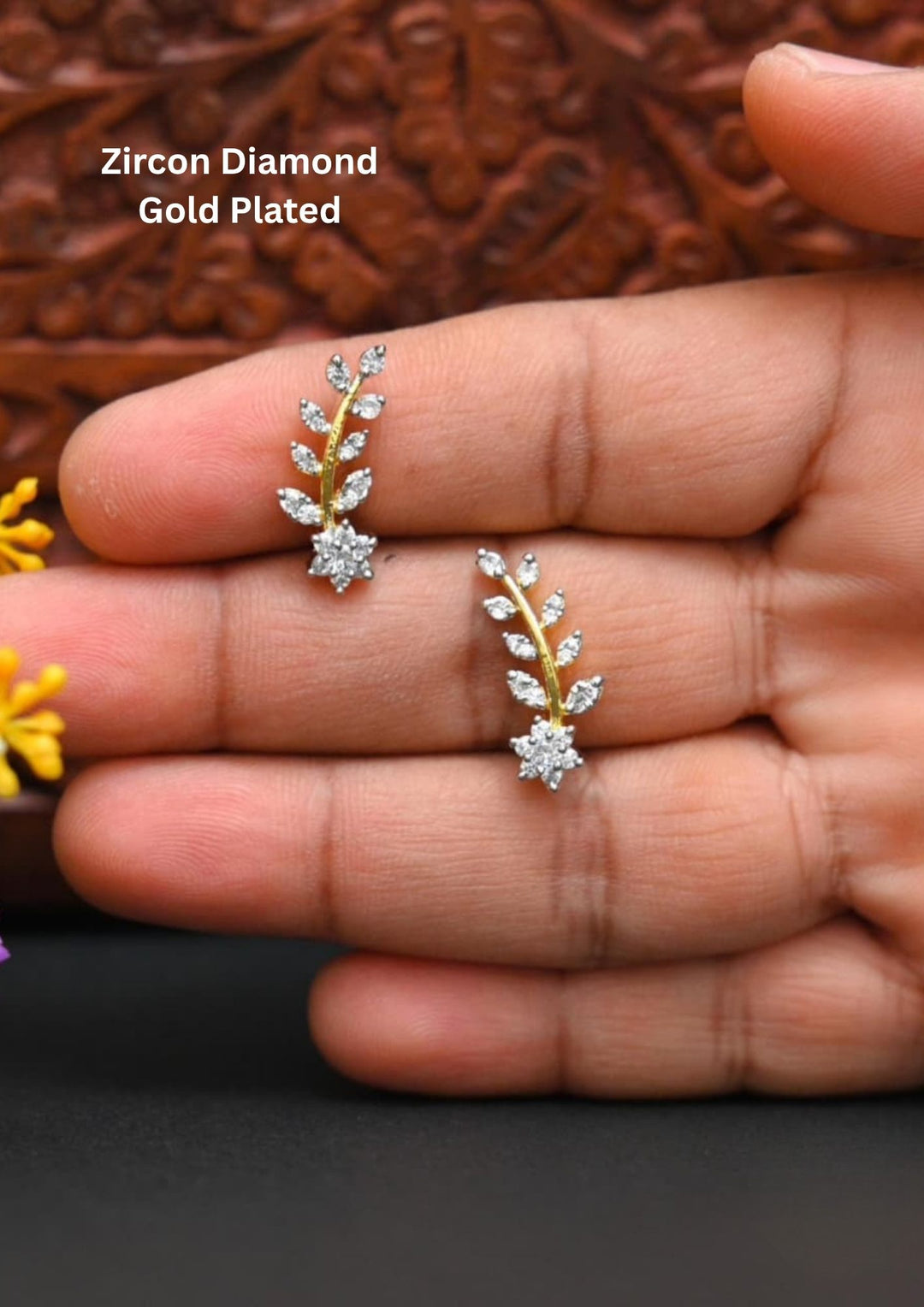 Zircon Diamond Gold Plated Leaf Model Ear Studs it is very simple studs and looking very classy and can use for office wear and daily ware skin safe and anti fade 