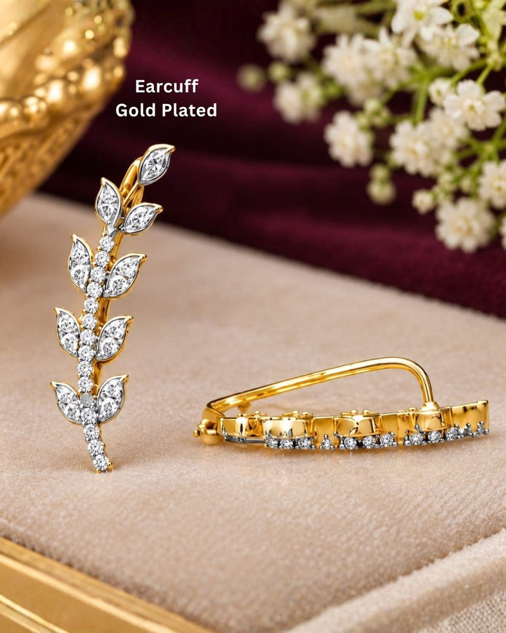 Stylish open ear cuff with gold plated detailing, leaf-shaped zircon accents, and sparkling stone embellishments.