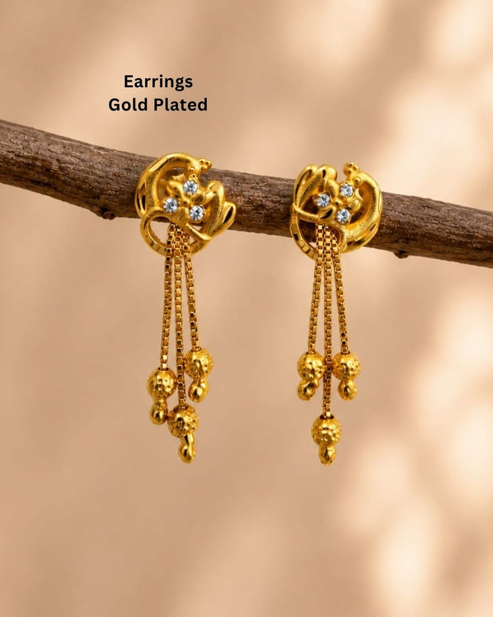 Stylish gold plated chain drop earrings featuring intricate curved detailing, sparkling white stones, multiple hanging chains, and polished gold ball accents. Perfect for festive occasions, traditional outfits, weddings, parties, and special events.