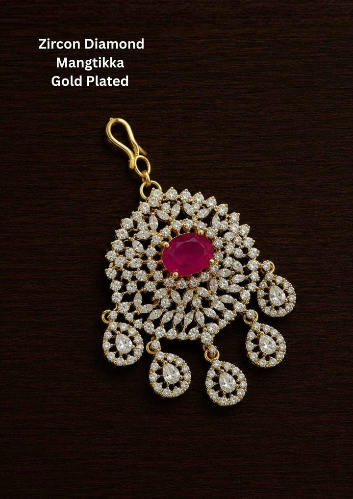 Gold-plated zircon diamond mangtikka (papidi billa) with a red gemstone comes with in detailed in picture and can be used for weeding's and  festivals