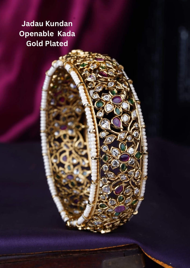 Gold-plated bracelet with gemstones comes with jadau kundan and it is openable kada and can be used for festivals , functions and can gift 