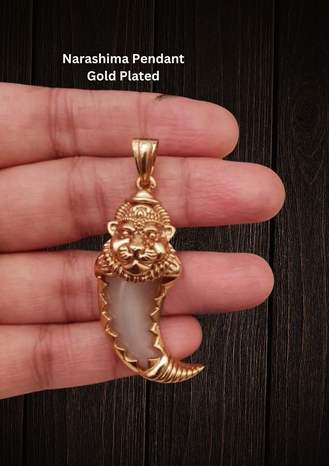 Gold-plated Narashima pendant with a lion design looks very clear in picture temple jewelry pendent with and can be used for festivals and weedings and also it is anti faded 