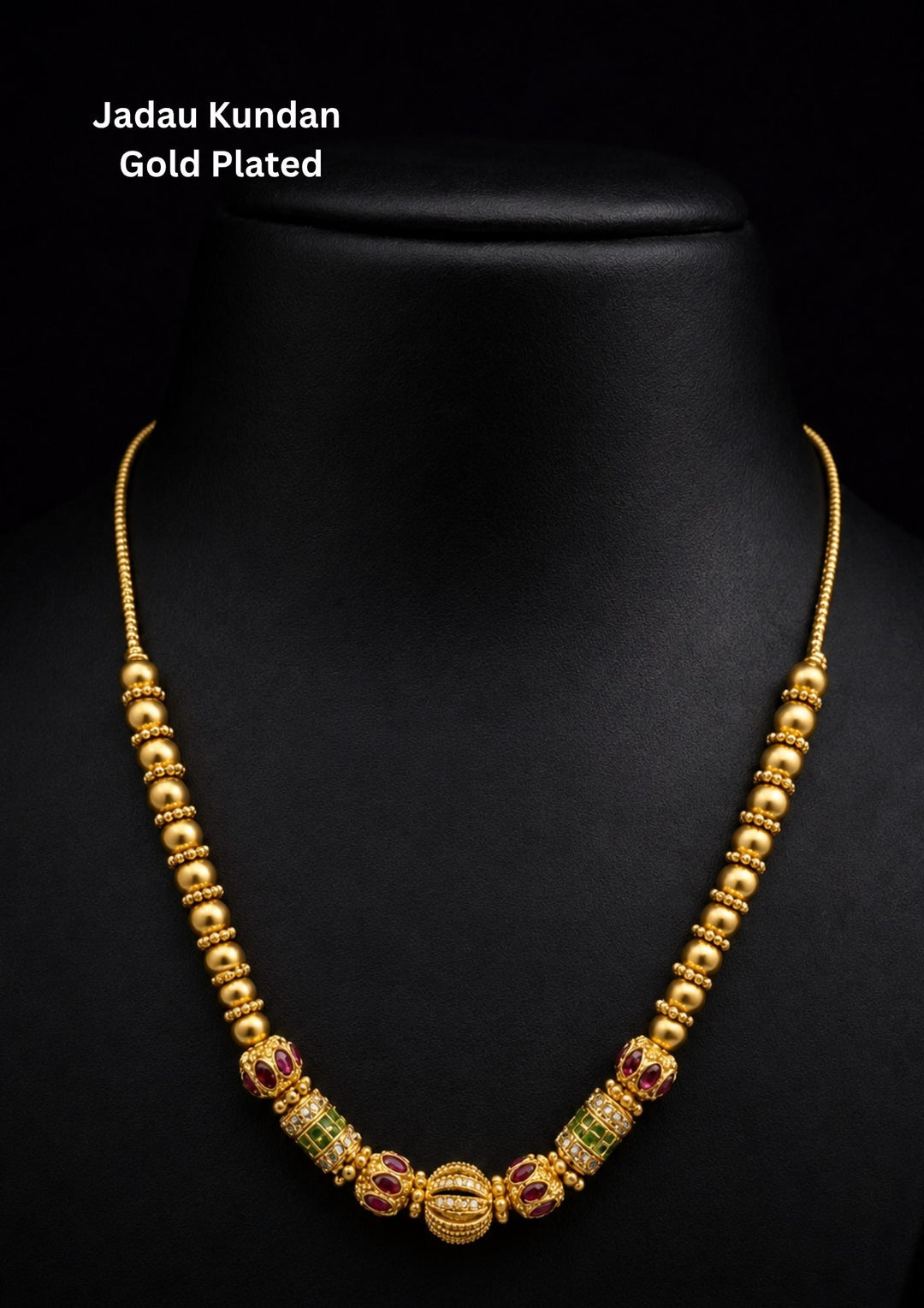 Gold-plated necklace with gemstones Gold-plated necklace with intricate design necklace and with green and red stones come with jadau kundan in necklace with beads and in pendent shows clear design and in detailed shown in picture it will not fade color and water proof can used for festivals, bridals, and weeding&