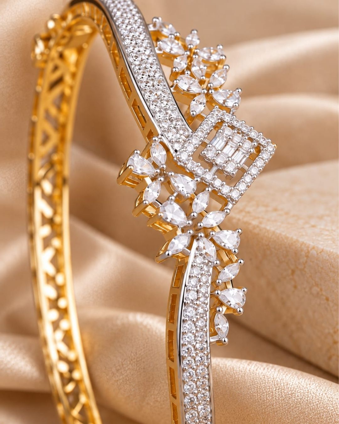Gold plated openable bracelet featuring a dual-tone gold and silver finish with sparkling white CZ stones and intricate floral embellishments.
