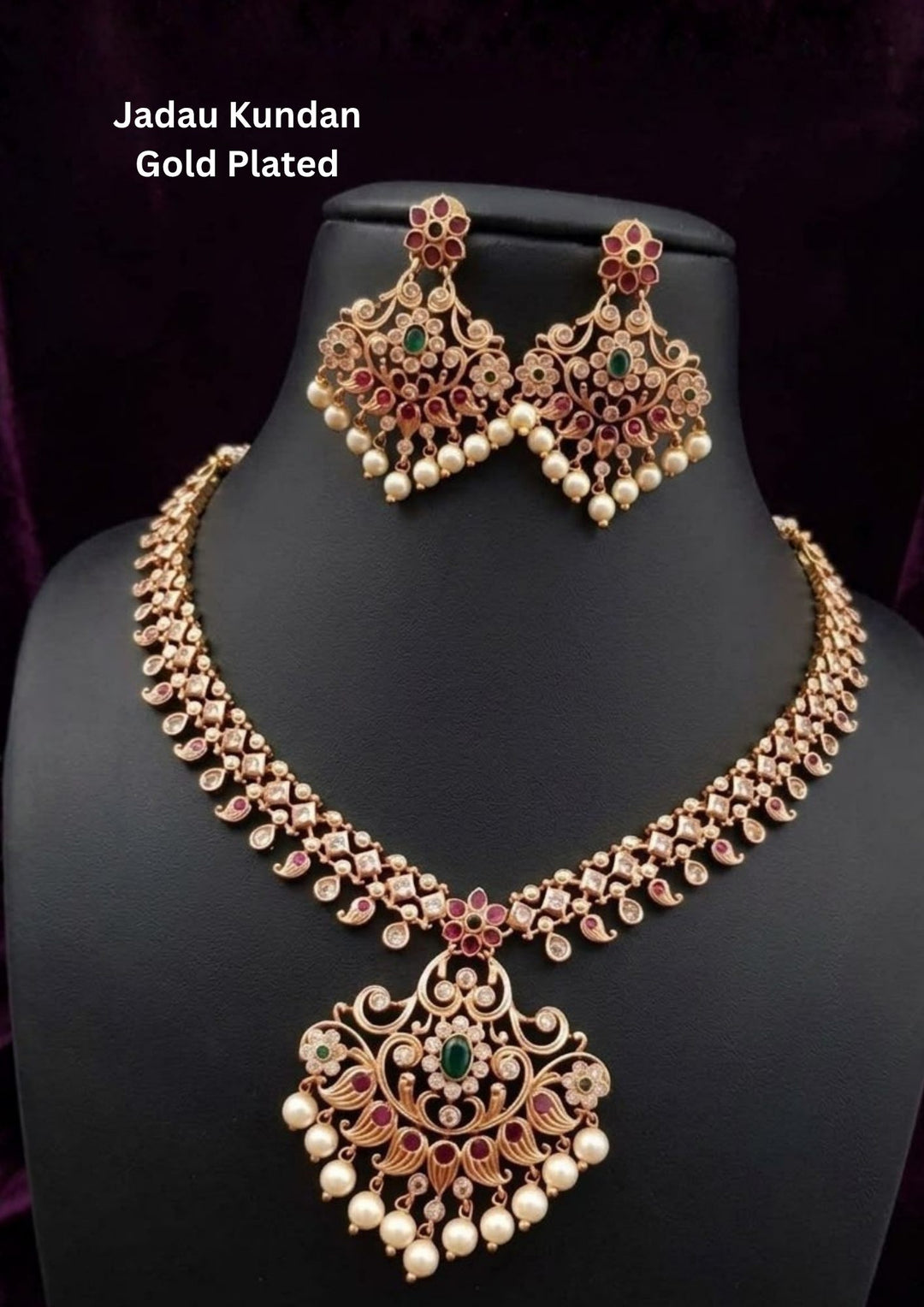 Gold-plated necklace design with short necklace with green and red stones come with jadau kundan in necklace with beads and in pendent shows clear design and in detailed shown in picture it will not fade color and water proof can used for festivals, bridals, and weeding's  