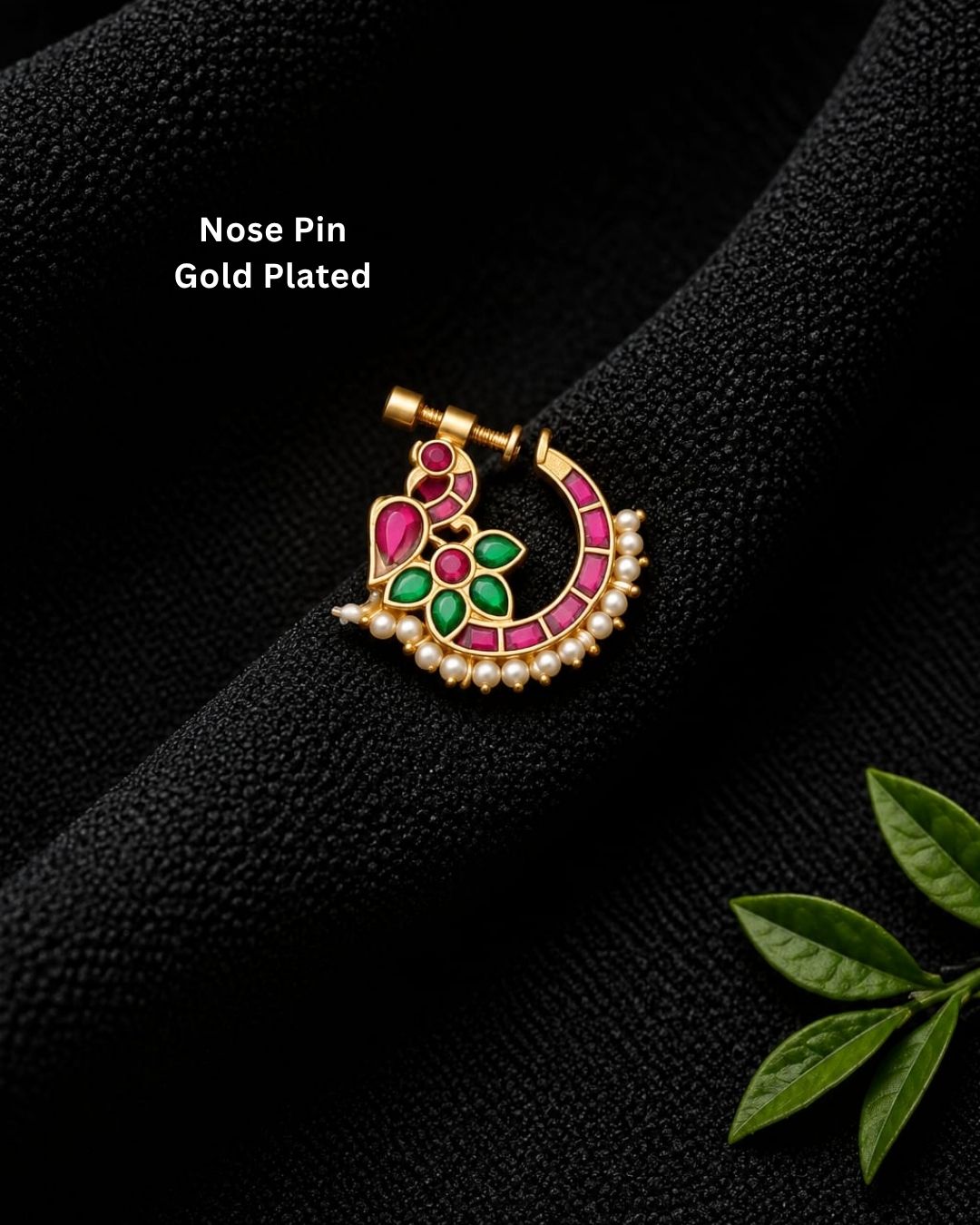 Traditional gold plated crescent nose pin featuring vibrant pink and green stones with a row of white pearls along the bottom.