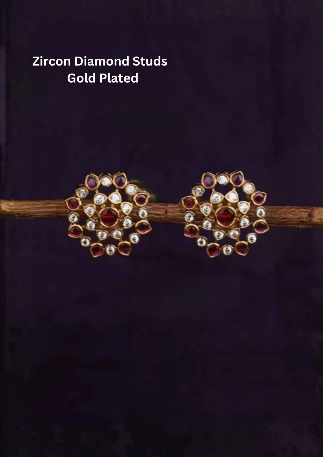 Kundan Gold Plated Polki Red Gemstones Studs design with traditional flower design, used green and red ruby stones and white pearls. These earrings have a gold finish, are lightweight, and comfortable to wear. Perfect for daily wear, pooja, weddings, festivals, functions, and family occasions. 