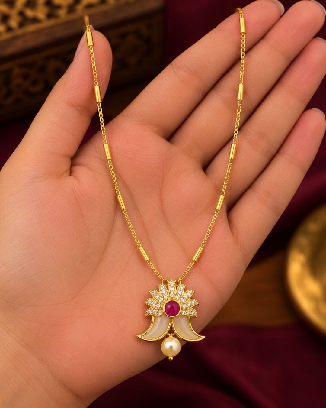 gold plated puligoru chain comes with pearl drop and rudy stone in pendent and show picture clearly how it looks and anti faded and skin safe and can be used for weeding&