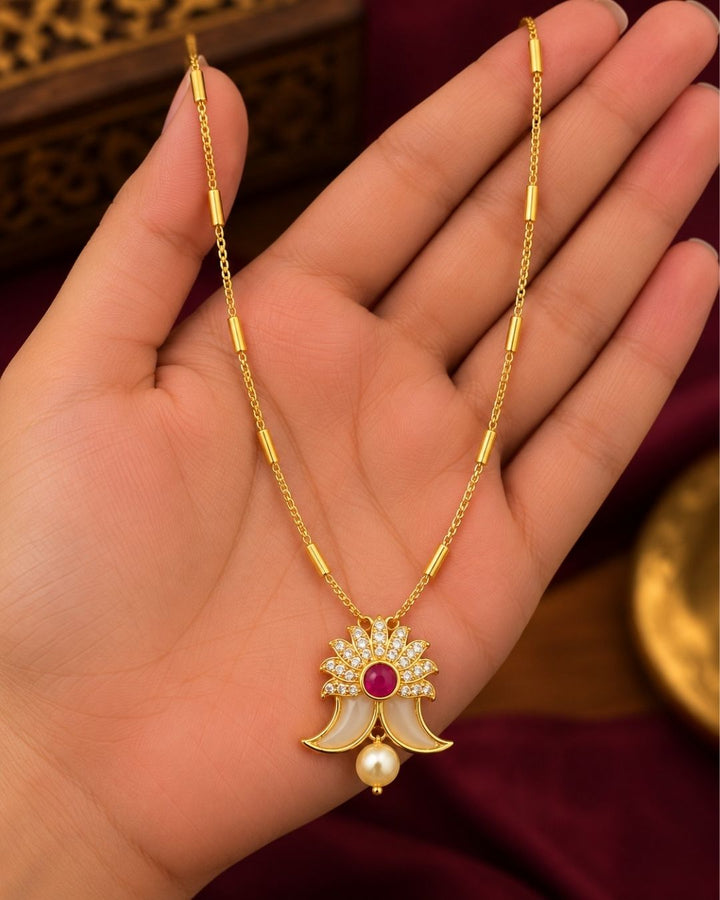 gold plated puligoru chain comes with pearl drop and rudy stone in pendent and show picture clearly how it looks and anti faded and skin safe and can be used for weeding&
