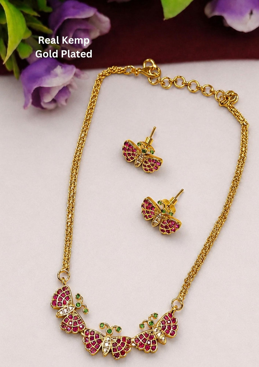 gold plated butterfly model real kemp necklace set and in image clearly shown how it looks and can be use for kitty part's , festivals 