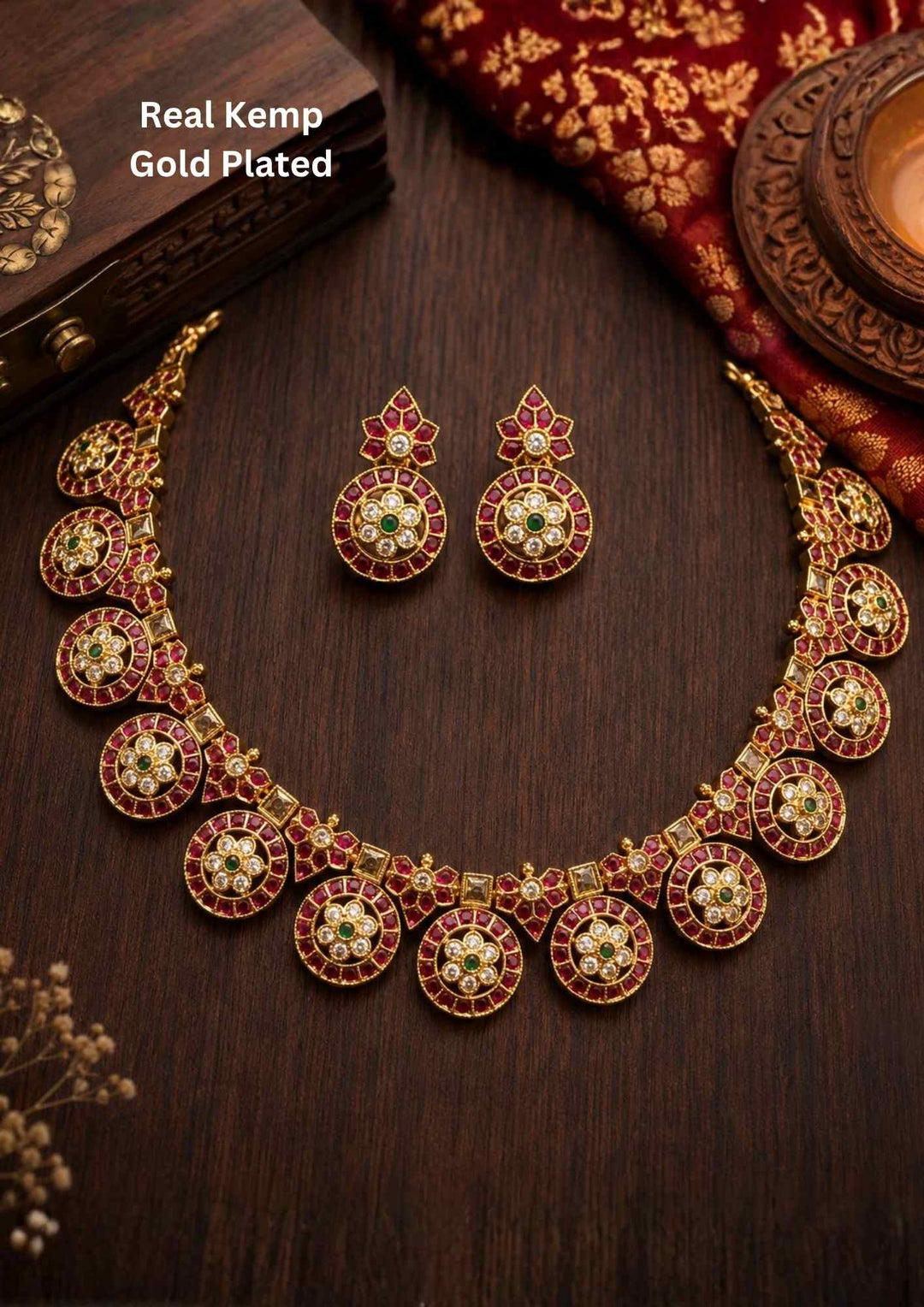 Gold-plated necklace and earrings comes with real kemp its is traditional south indian necklace set and it is anti faded necklace set and can be used for weeding&