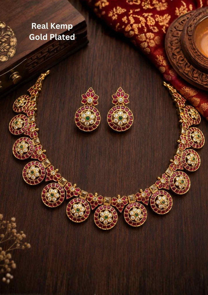 Gold-plated necklace and earrings comes with real kemp its is traditional south indian necklace set and it is anti faded necklace set and can be used for weeding&
