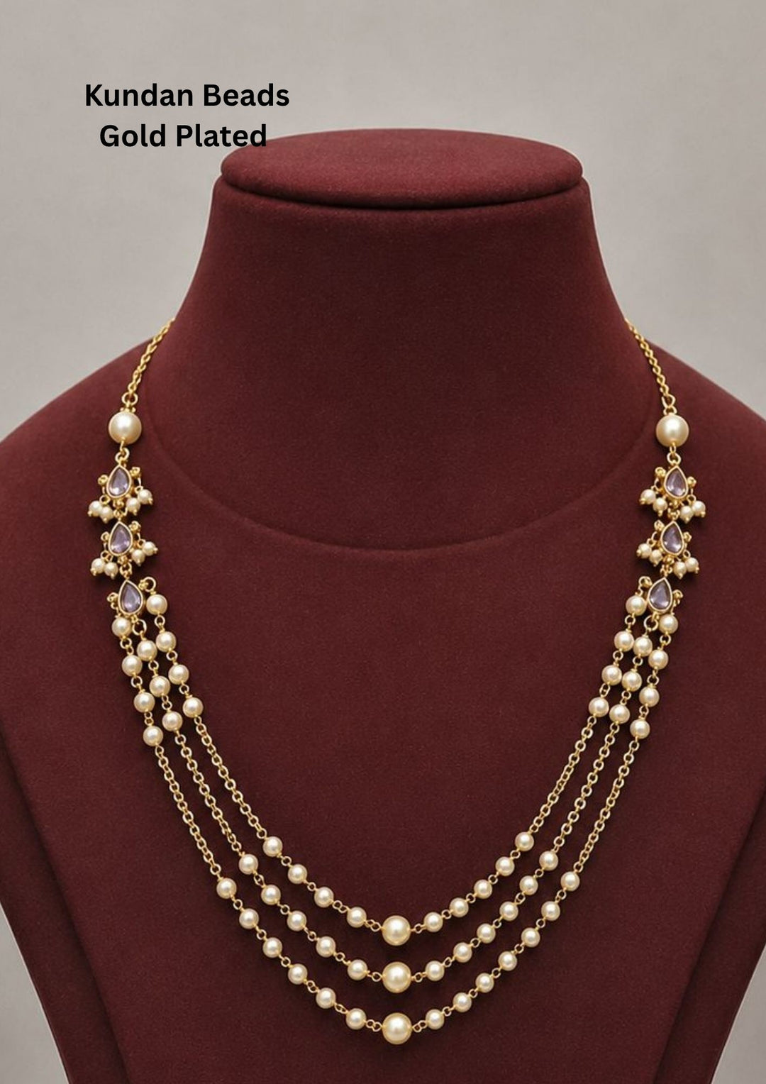 Gold-plated necklace with pearls on purple gemstone