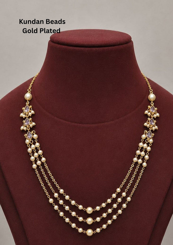 Gold-plated necklace with pearls on purple gemstone