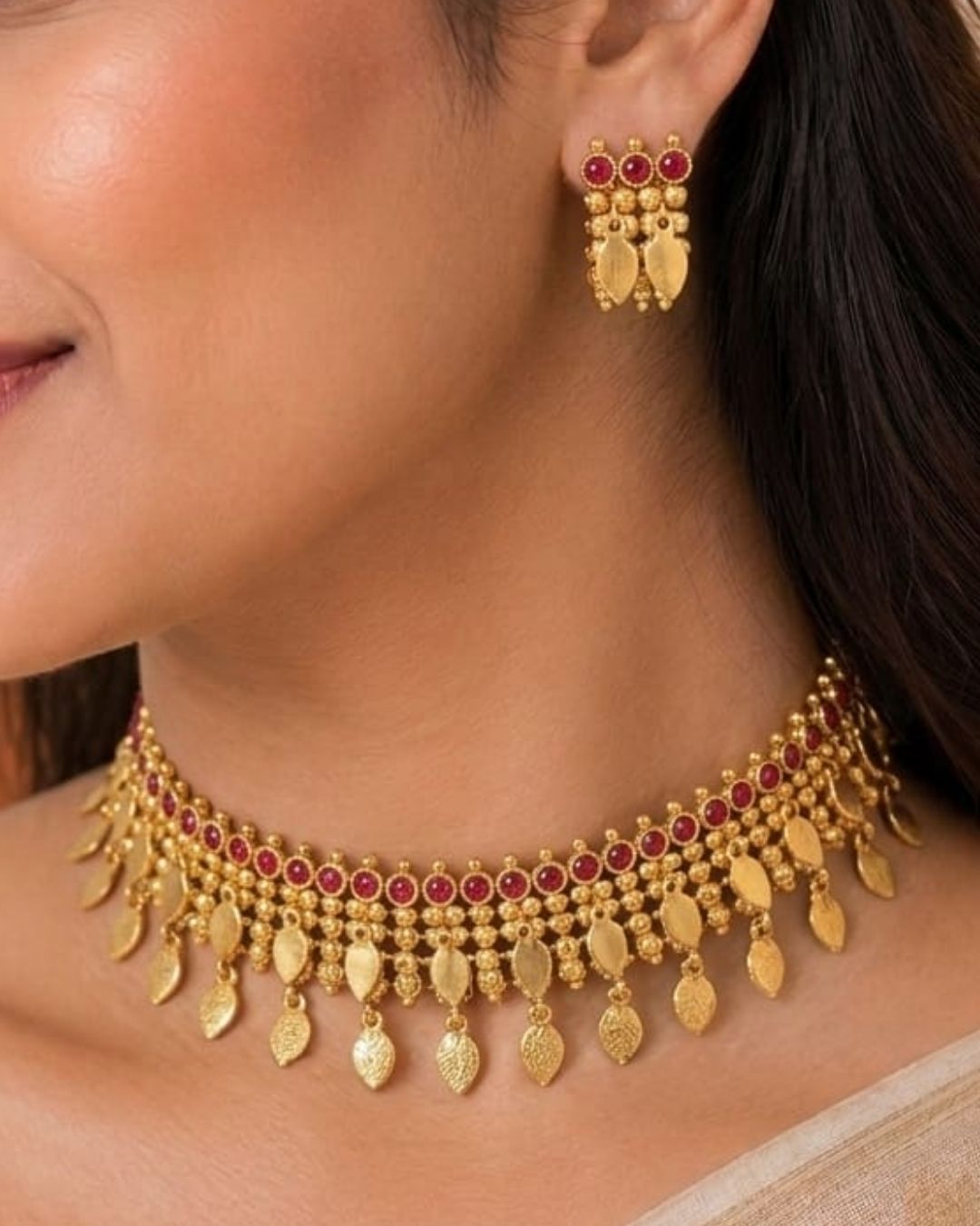 South indian women Beautiful gold plated Kundan choker necklace set featuring a detailed ruby stone border, layered golden beadwork, and elegant hanging motifs, paired with matching earrings. Perfect for festive occasions, traditional wear, weddings, and gifting.