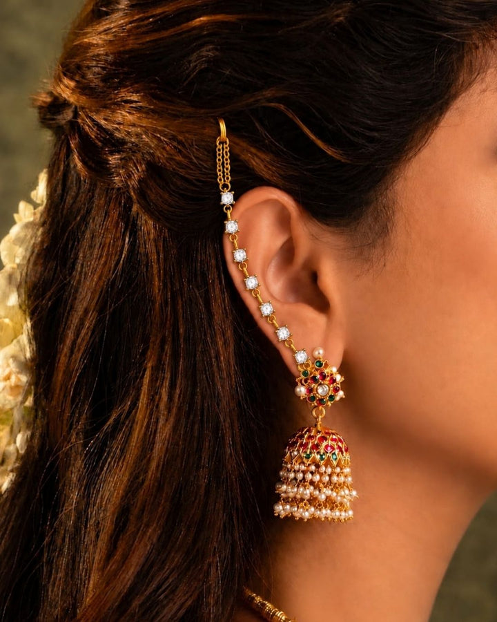 Gold plated designer ear chains featuring sparkling white square zircon stones arranged in a vertical pattern with delicate gold links.