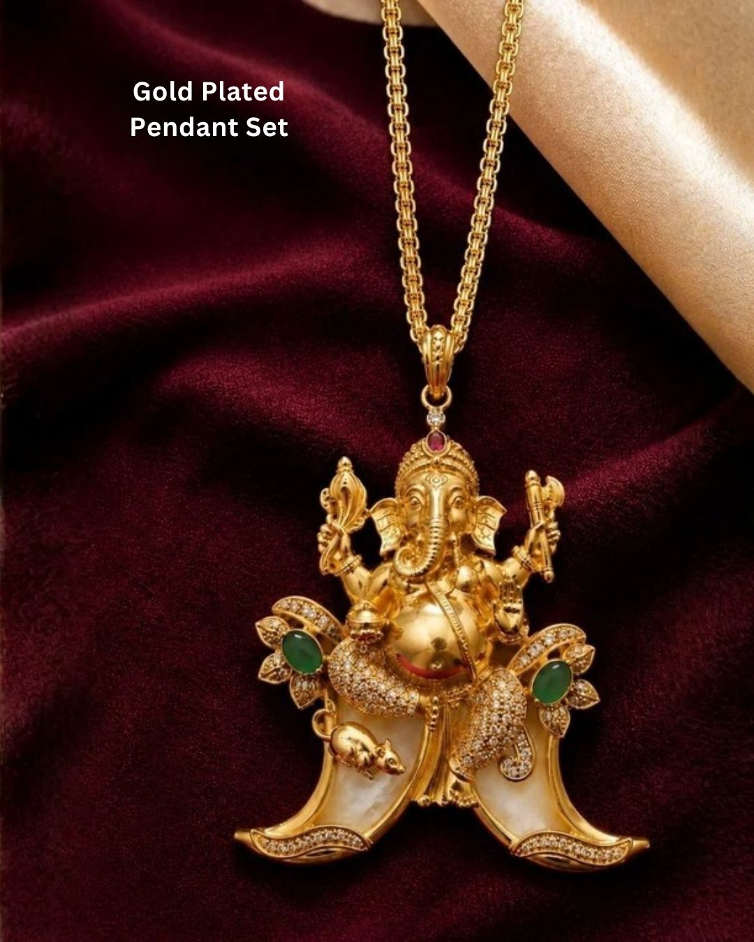 men wearing A traditional gold plated temple style pendant featuring an intricately sculpted idol of Lord Ganesha seated above a curved double tiger claw (pulinakha) motif. The piece is adorned with shimmering white crystals, ruby-red crown details, and green stone side accents, held up by a hand with blurred jewelry store displays in the background.