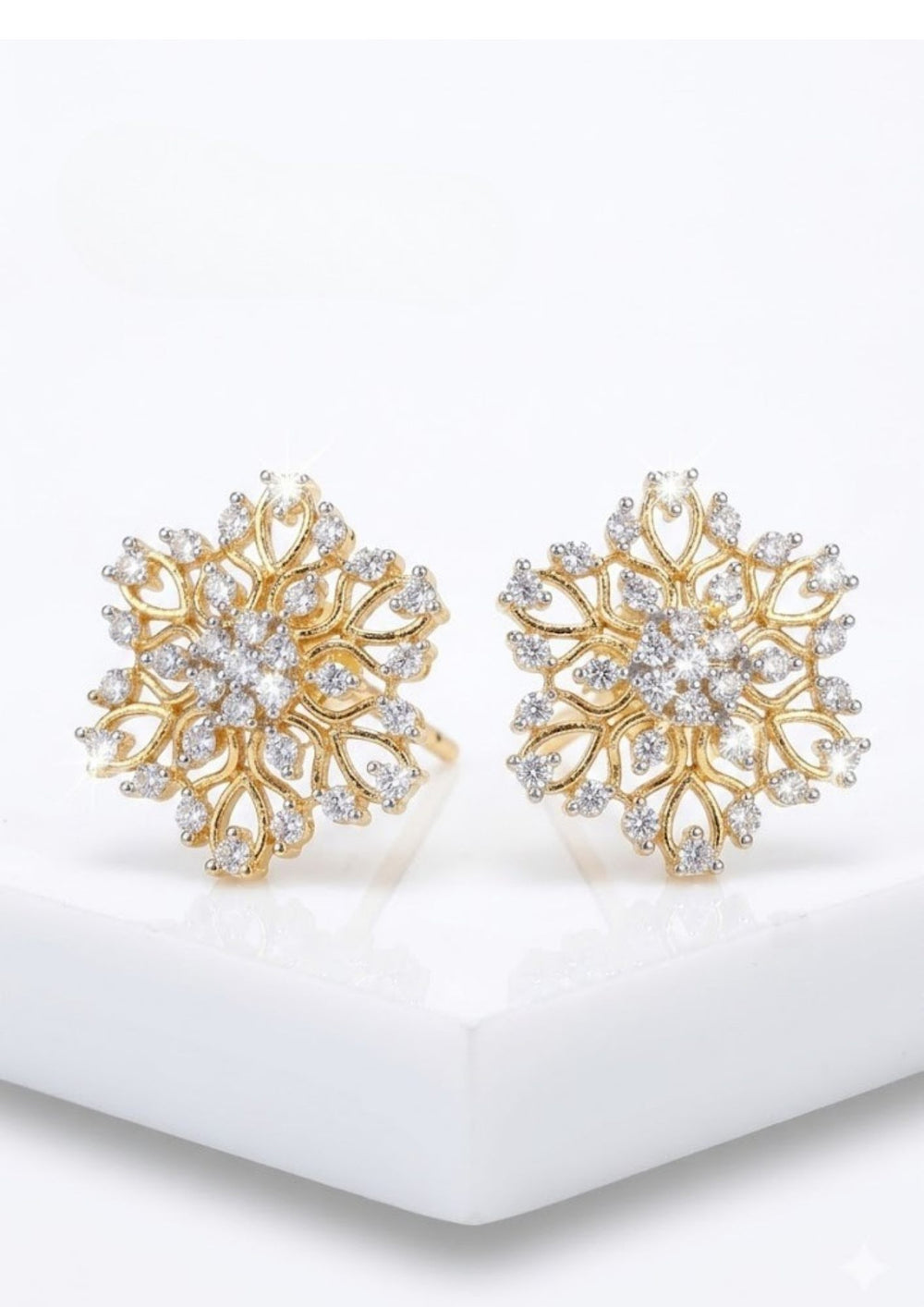 gold plated studs are delicate and paired in white background and used for daily ware, office ware and festive ware 
