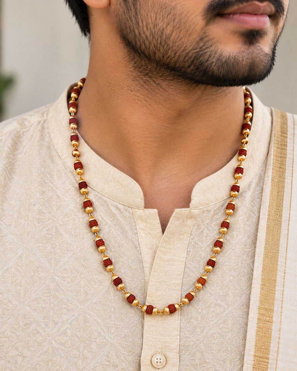 Beautiful Rudraksha Mala featuring alternating Rudraksha beads and gold plated decorative elements. Perfect for daily wear, spiritual occasions, temple visits, traditional outfits, festive occasions, and premium gifting.