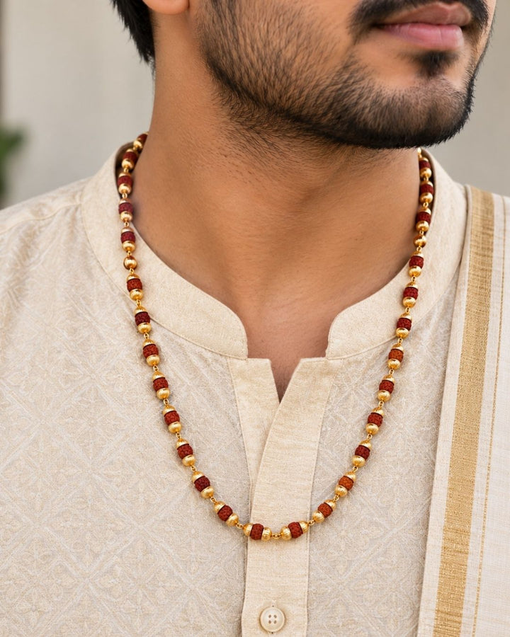 Beautiful Rudraksha Mala featuring alternating Rudraksha beads and gold plated decorative elements. Perfect for daily wear, spiritual occasions, temple visits, traditional outfits, festive occasions, and premium gifting.