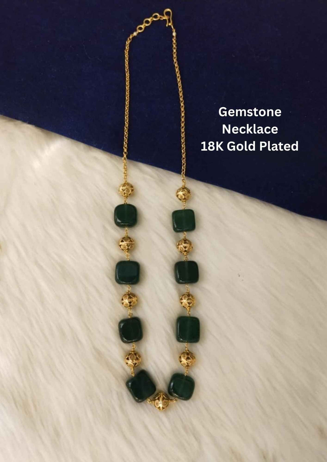 Gold and green gemstone necklace