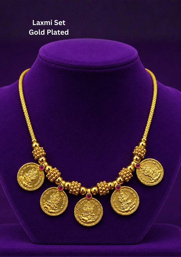 Gold plated Laxmi coin necklace featuring traditional Lakshmi motif coins with elegant temple-inspired craftsmanship. Perfect for festivals, poojas and traditional occasions.