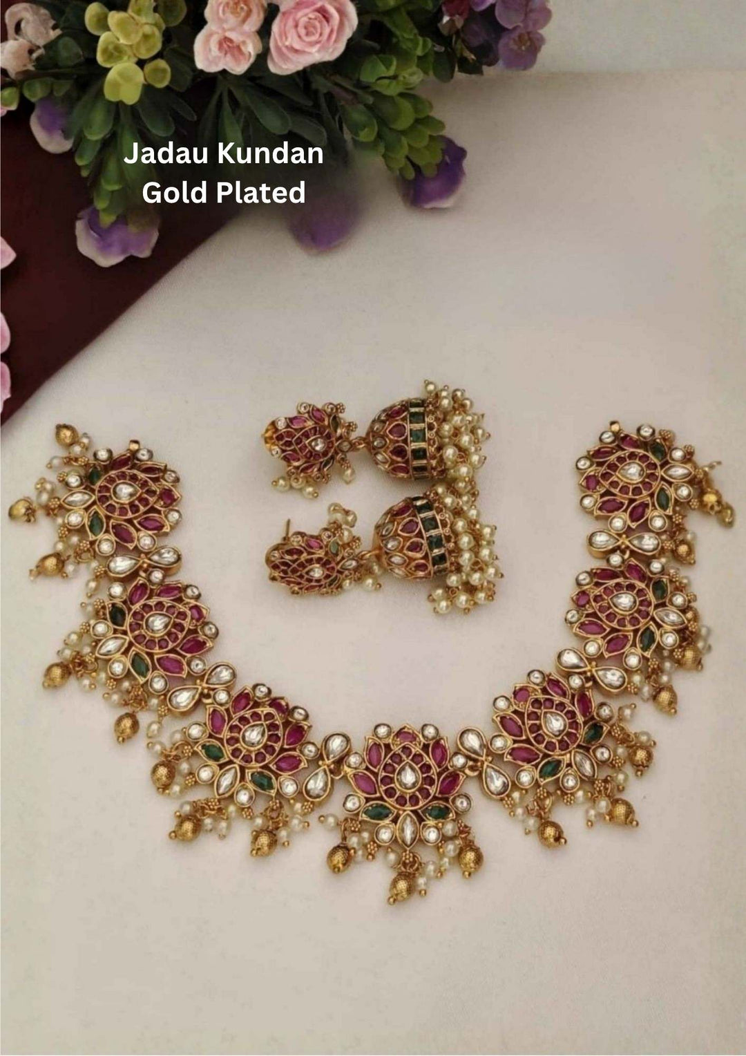 Gold-plated necklace and earrings with lotus model and those are lightweight and can be used for festivals and functions