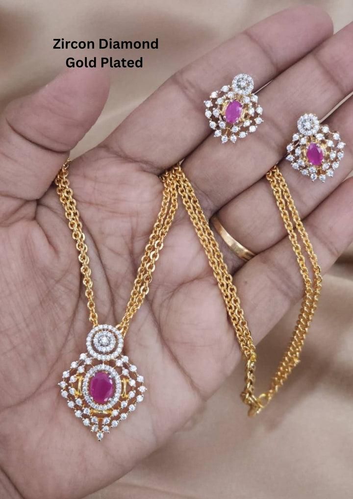 Gold necklace and earrings with zircon and diamond accents