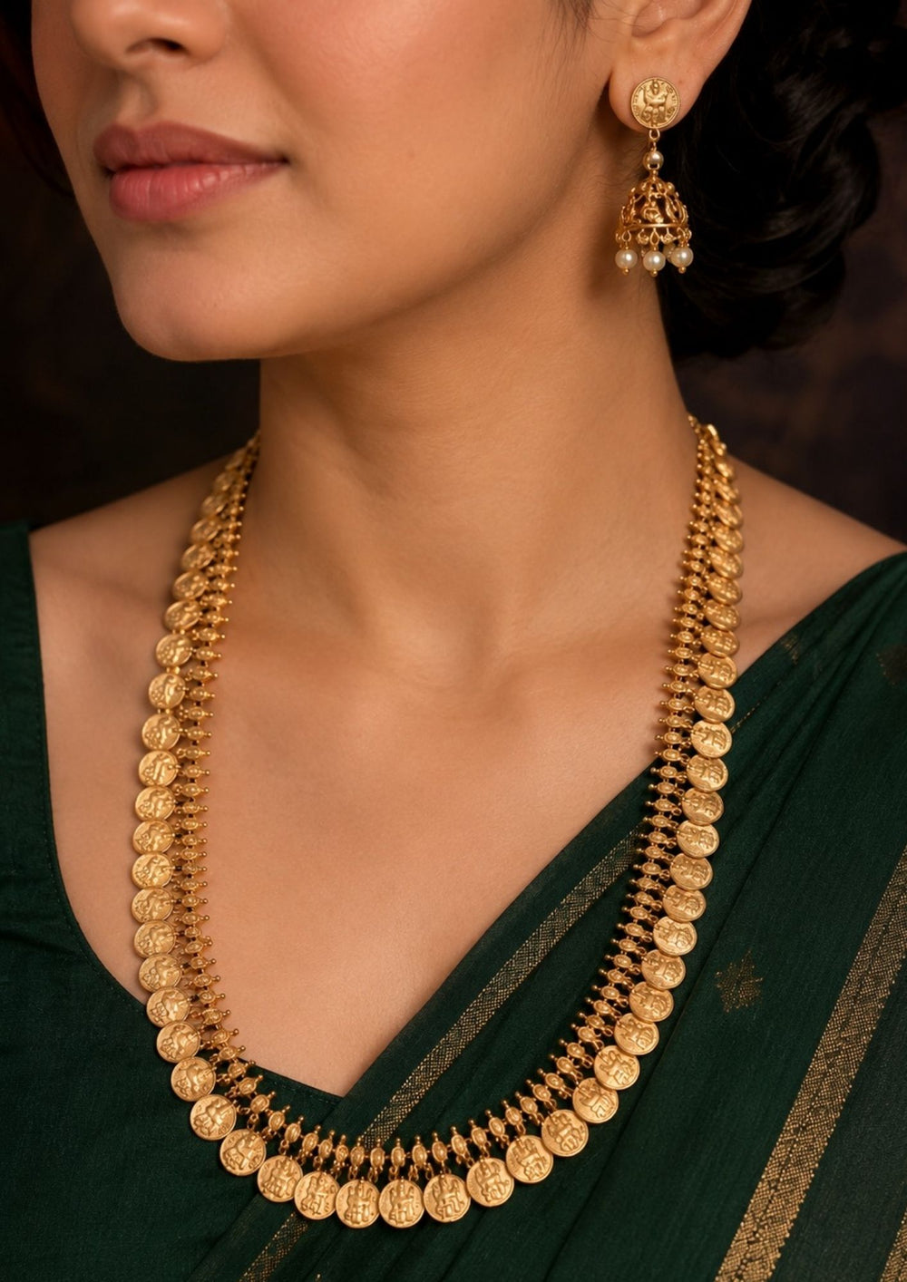 South Indian women styling an antique gold plated temple choker necklace set designed with detailed Laxmi Nakshi patterns and an elegant matte gold finish that gives a graceful traditional look for festive celebrations, poojas, family functions, and bridal outfits with lightweight comfortable use and COD available now.