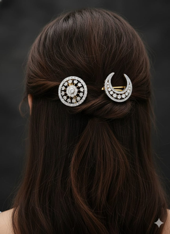 Hair accessories sun and moon in a styled hair setting on a hair of a girl