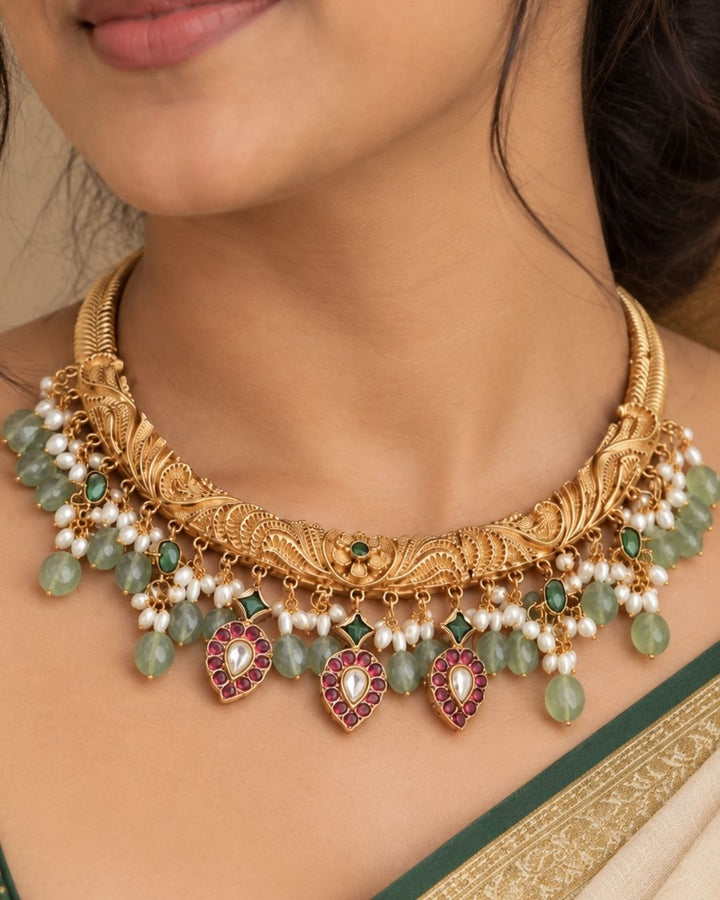 jadau kundan gold-plated necklace and earrings and in image necklace and earrings look very classy and the beads with light weight earrings and can be use for festivals. weeding&