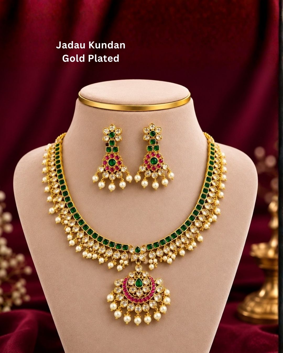Beautiful gold plated necklace and earrings set featuring intricate green stone detailing, sparkling white stones, pink accents, and multiple pearl drops. Perfect for weddings, festive occasions, traditional outfits, celebrations, and elegant gifting.